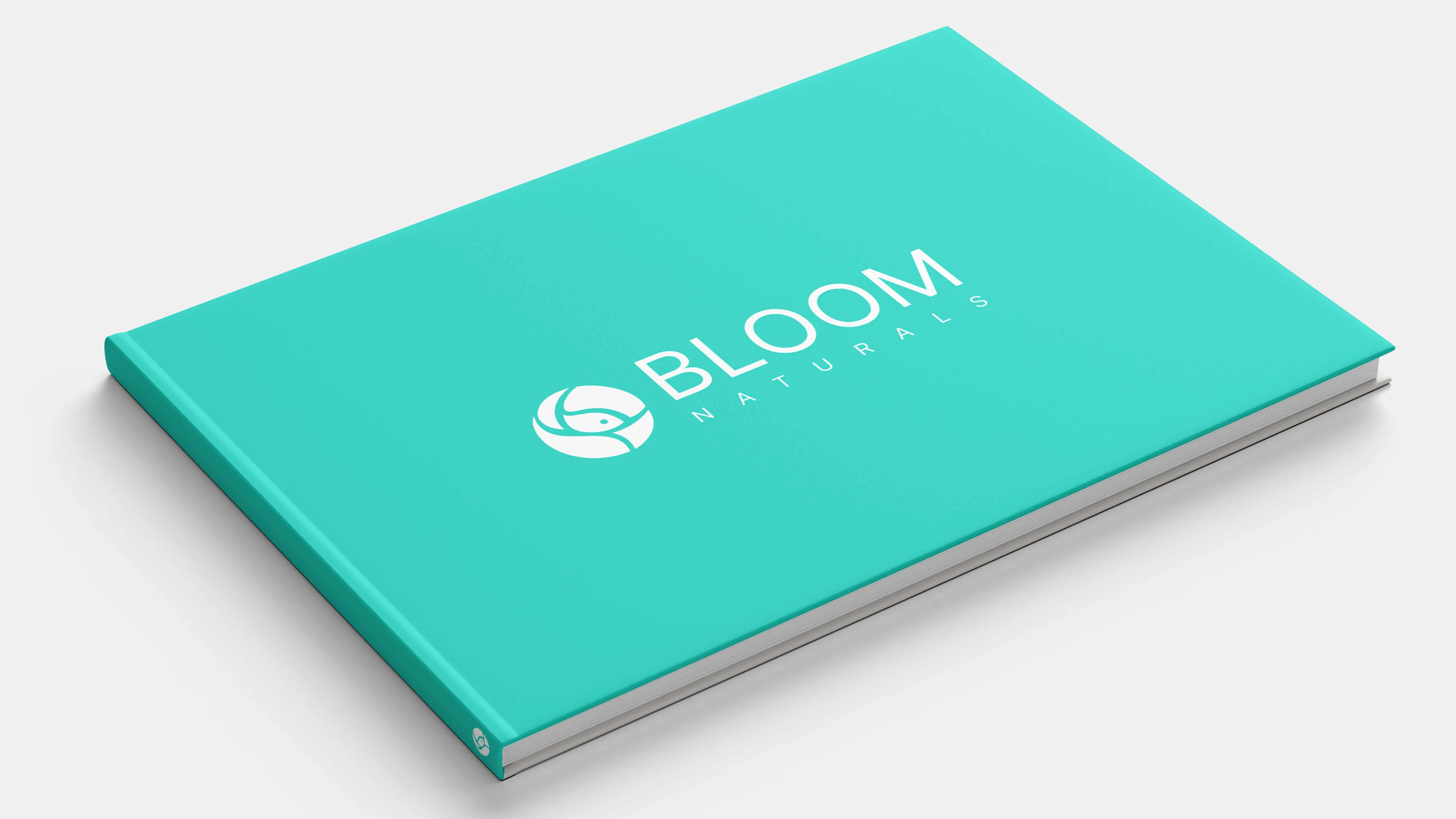 Bloom Naturals — the teal brand book with the white rose monogram