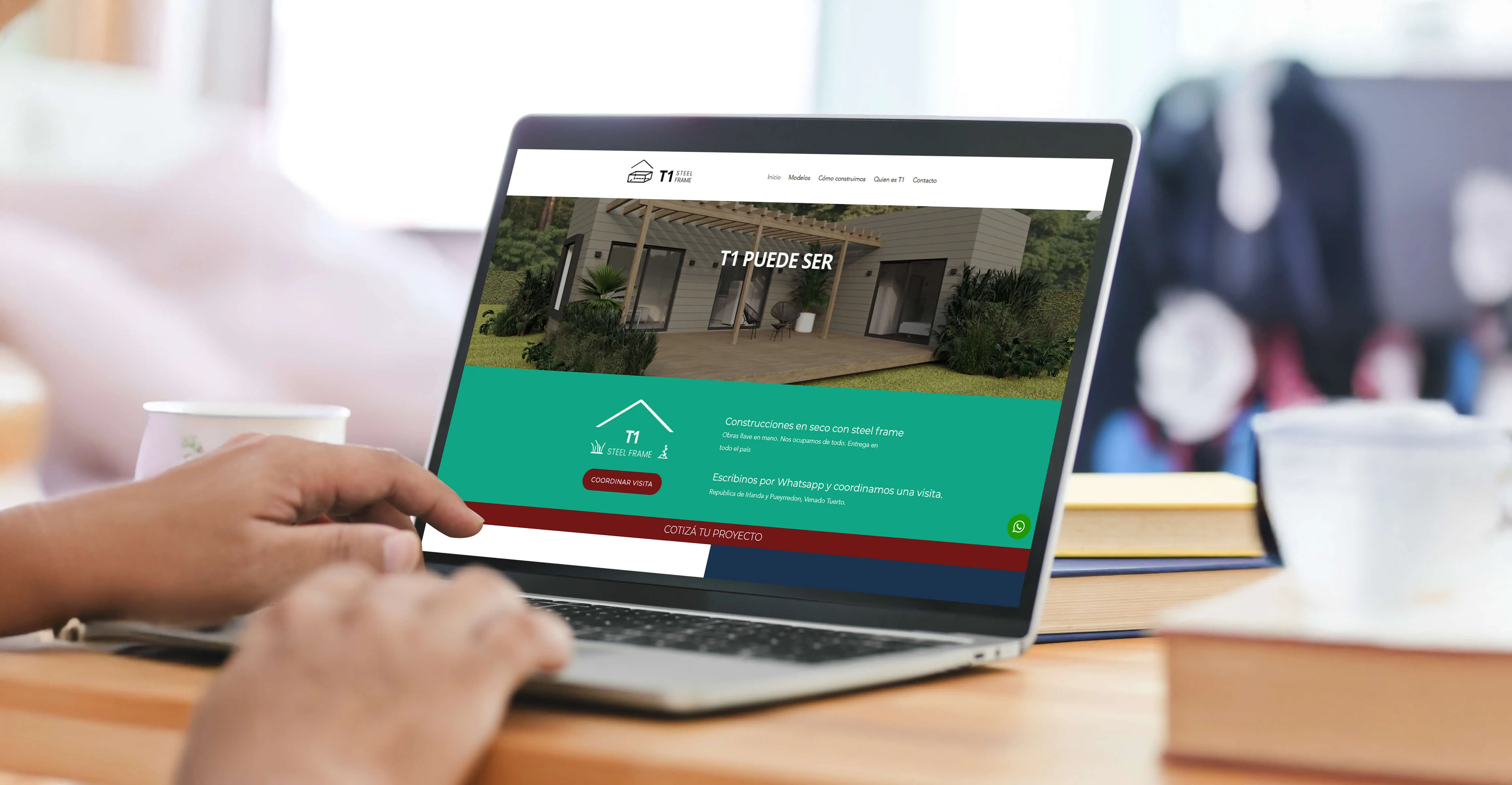 T1 Steel Frame — the company website open on a laptop
